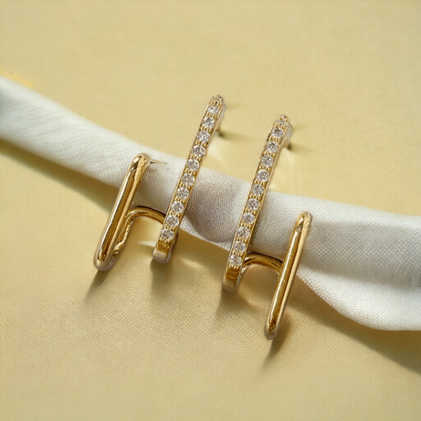 Front view of SobPai irregular U-shaped gold color earrings"