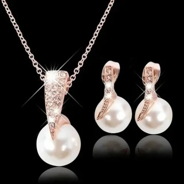 Image of SobPai Delysia King 3pcs jewelry set including pearl earrings and necklace in rose gold.