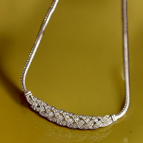 Close-up view of SobPai Women's Crystal Chain Choker Necklace in Silver, featuring a water drop design and sparkling crystals.