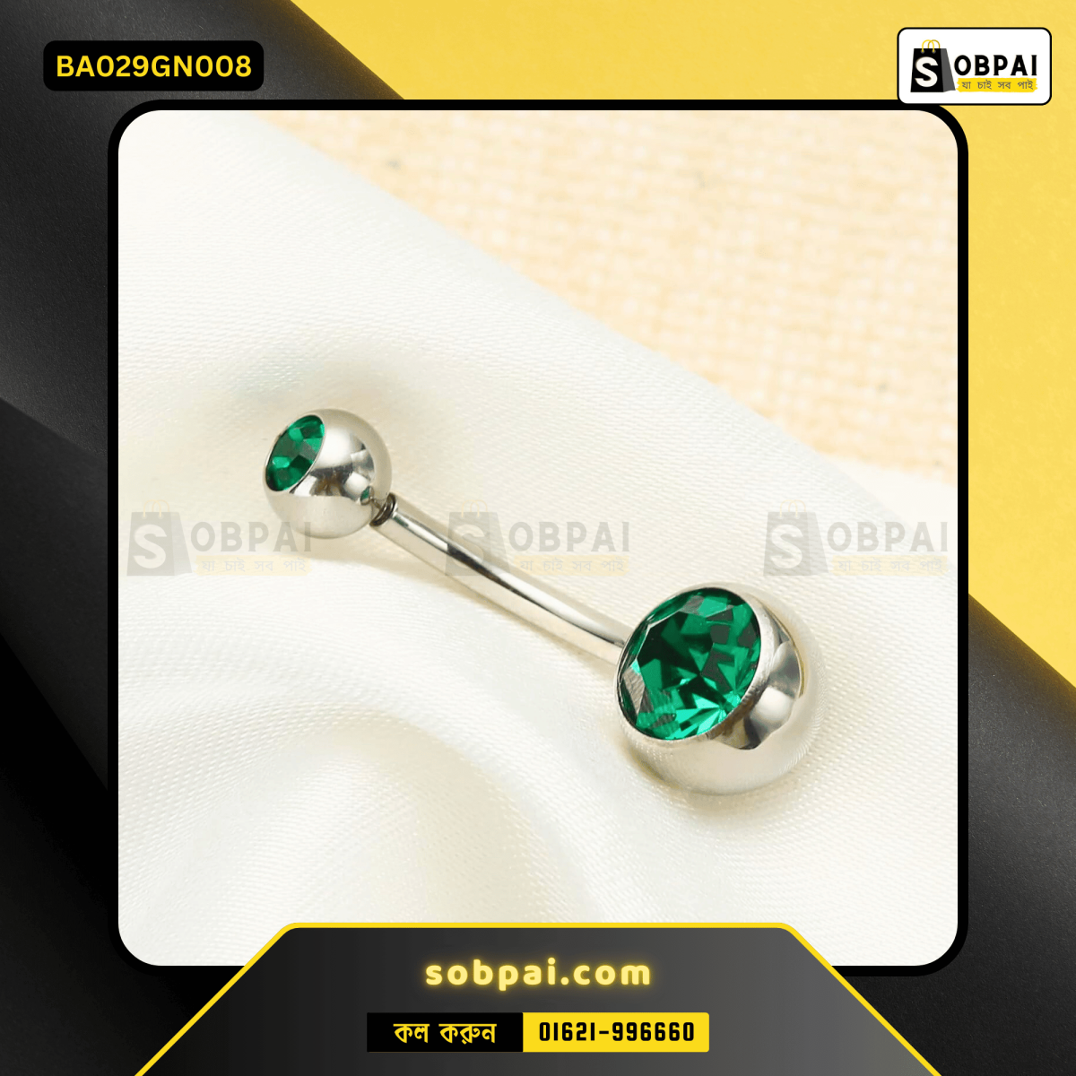 Elegant belly button piercing in green featuring a sparkling rhinestone.